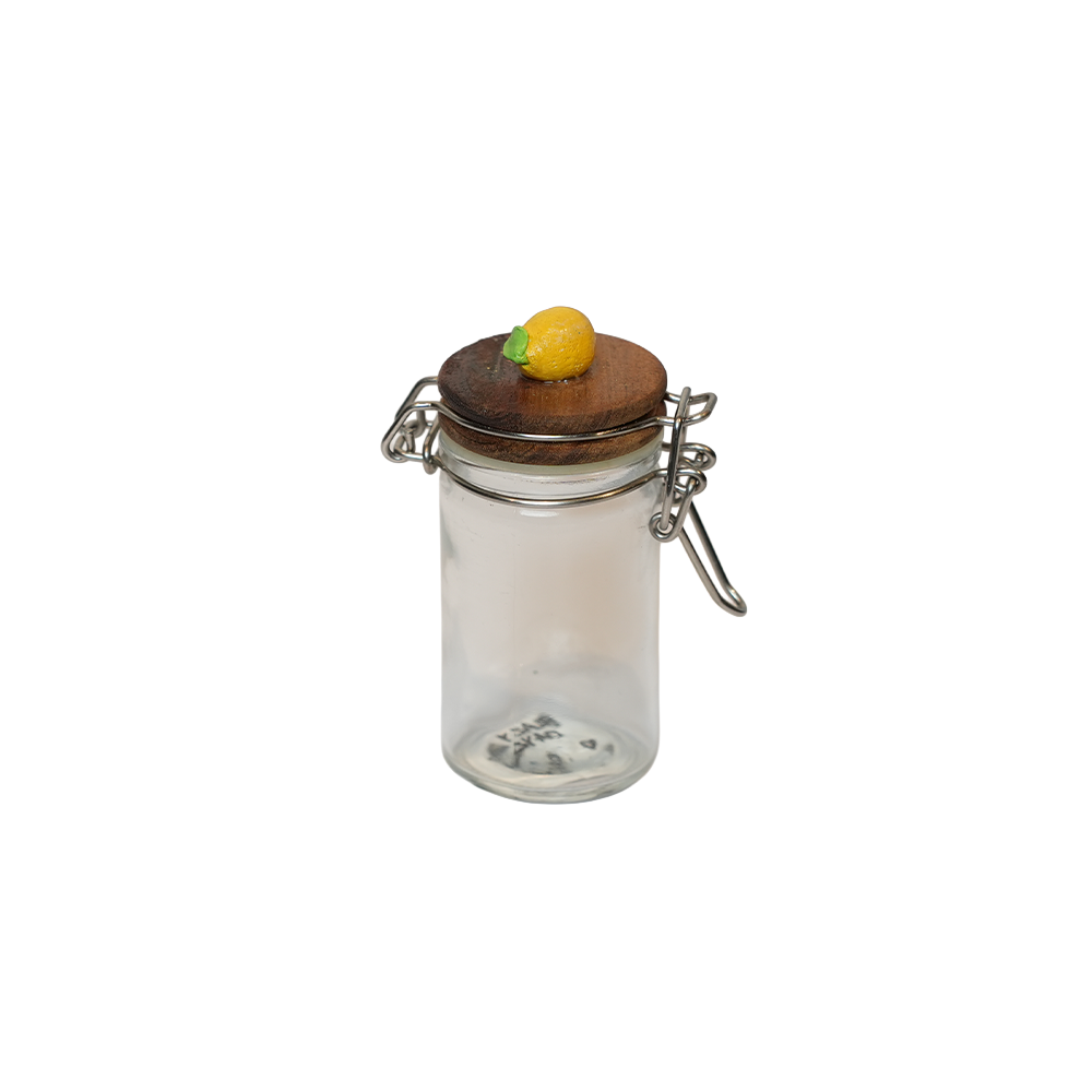 Glass Jar with Clay Figure